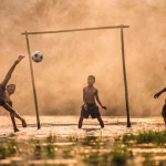 boy kicking soccer ball 73899 442